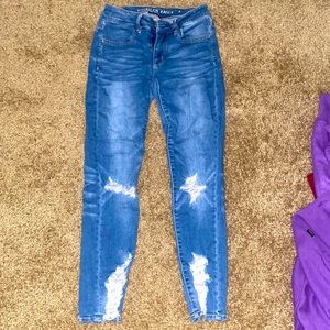 Dark blue American Eagles Jeans …. Size 4 in women’s !